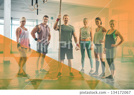 Group fitness, people and portrait at gym for exercise, workout and rope training. Personal trainer with happy men and women for power challenge, commitment or strong muscle at a club with a overlay 134172067