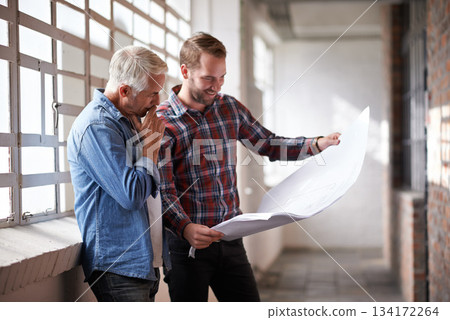 Architecture teamwork, holding blueprint and reading with planning, analysis or thinking of real estate. Men, paper and design for property, construction or building with talk, brainstorming and help Architecture teamwork, holding blueprint and reading with planning, analysis or thinking of real estate. Men, paper and design for property, construction or building with talk, brainstorming and help 134172264
