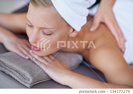 Relax, calm and a woman at a spa for a massage, body treatment and masseuse care. Luxury, sleeping and a young lady at a salon for back massaging, relaxation and peace on a vacation with a therapist Relax, calm and a woman at a spa for a massage, body treatment and masseuse care. Luxury, sleeping and a young lady at a salon for back massaging, relaxation and peace on a vacation with a therapist 134172279