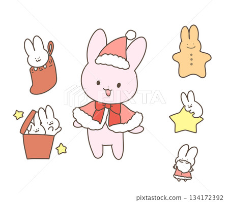 Rabbit and stuffed rabbit making a snowman Rabbit and stuffed rabbit making a snowman 134172392