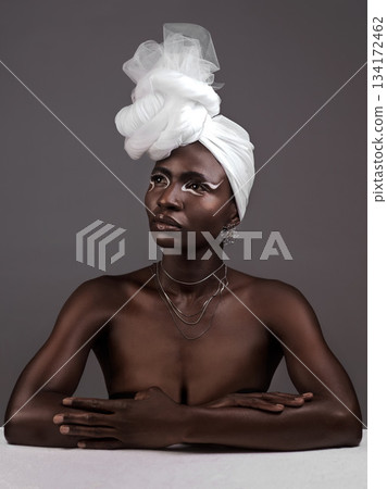 Beauty, fashion and black woman with makeup, thinking and confident against a grey studio background. Female person, girl and model with ideas, fantasy and feminine with fierce attitude and culture Beauty, fashion and black woman with makeup, thinking and confident against a grey studio background. Female person, girl and model with ideas, fantasy and feminine with fierce attitude and culture 134172462