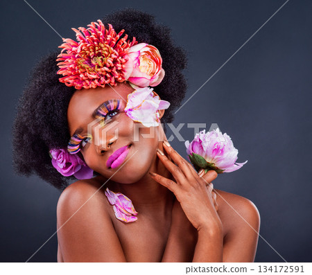 Beauty, flowers and black woman in studio for makeup, creative and organic on black background. Floral, body care and african female model pose with eco friendly, natural and cosmetics with mockup Beauty, flowers and black woman in studio for makeup, creative and organic on black background. Floral, body care and african female model pose with eco friendly, natural and cosmetics with mockup 134172591