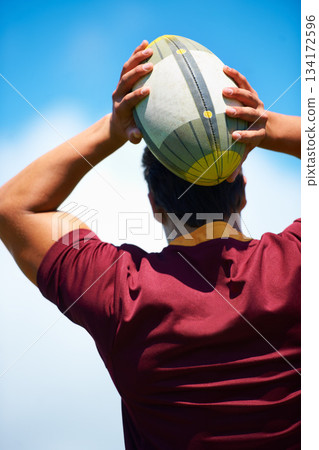 Back, rugby and man with a ball, game and fitness with exercise, playing and workout. Professional player, guy and athlete with training, practice for a match and sports with confidence and wellness Back, rugby and man with a ball, game and fitness with exercise, playing and workout. Professional player, guy and athlete with training, practice for a match and sports with confidence and wellness 134172596