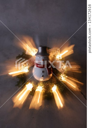 Lighted Christmas wreath and snowman Lighted Christmas wreath and snowman 134172616