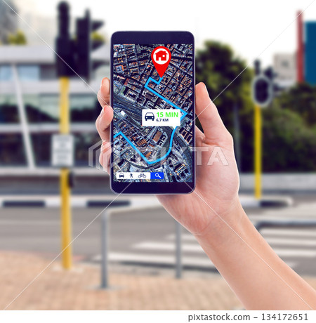 Closeup, city and hand with a smartphone, map and connection for direction, travel or streets. Holding a cellphone, person or traveler with a mobile app, roads or technology for transport or location 134172651