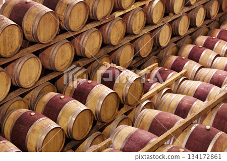 Storage, winery cellar and wood barrel collection or red wine, alcohol and luxury, vineyard industry container and process. No people, warehouse and expensive vintage, drink vault or grape business Storage, winery cellar and wood barrel collection or red wine, alcohol and luxury, vineyard industry container and process. No people, warehouse and expensive vintage, drink vault or grape business 134172861