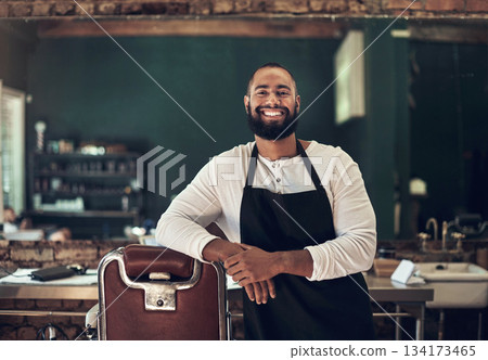 Barber shop, hair stylist and black man portrait of an entrepreneur with a smile. Salon, professional worker and male person face with happiness and proud from small business and beauty parlor Barber shop, hair stylist and black man portrait of an entrepreneur with a smile. Salon, professional worker and male person face with happiness and proud from small business and beauty parlor 134173465
