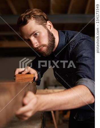 Carpenter, wood sanding and man working on building construction and architecture project. Home improvement, maintenance and handyman work of a young male employee with carpentry tool for woodwork Carpenter, wood sanding and man working on building construction and architecture project. Home improvement, maintenance and handyman work of a young male employee with carpentry tool for woodwork 134173549