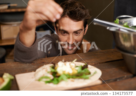 Chef, man and seasoning food in kitchen for delicious meal, healthy diet and nutrition. Cooking, sprinkle spices and male cook preparing dish for fine dining in rustic restaurant or small business. Chef, man and seasoning food in kitchen for delicious meal, healthy diet and nutrition. Cooking, sprinkle spices and male cook preparing dish for fine dining in rustic restaurant or small business. 134173577