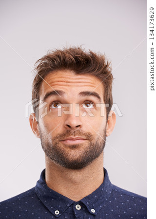 Thinking, looking up and man in studio with solution, ideas and relax with eyes and mockup. Isolated, gray background and male model face think and distracted with planning with decision alone Thinking, looking up and man in studio with solution, ideas and relax with eyes and mockup. Isolated, gray background and male model face think and distracted with planning with decision alone 134173629