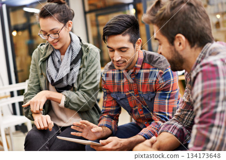 Tablet, people in a meeting at cafe or coffee shop with tablet and talking about startup ideas. Teamwork or collaboration, technology and students or friends together in discussion about project Tablet, people in a meeting at cafe or coffee shop with tablet and talking about startup ideas. Teamwork or collaboration, technology and students or friends together in discussion about project 134173648