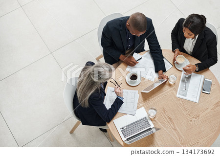 Top view, staff and group with teamwork, meeting and collaboration for new project. Business people, team and man with women, brainstorming and discussion with review, feedback and share ideas Top view, staff and group with teamwork, meeting and collaboration for new project. Business people, team and man with women, brainstorming and discussion with review, feedback and share ideas 134173692