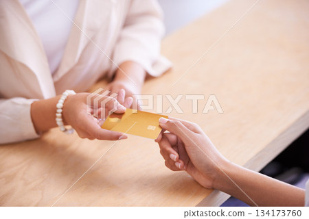 Payment, shopping and hands of people with a credit card to pay for booking or reservation. Retail, customer and a woman giving for transaction, sales and paying for services at a store or reception 134173760