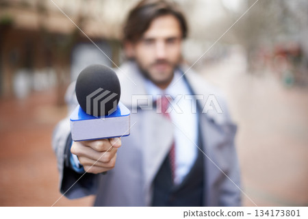 Interview, man and hand with microphone for press, news broadcast or question in the city. Tv journalist, conversation and a male reporter with a mic for discussion, interviewing and work in media Interview, man and hand with microphone for press, news broadcast or question in the city. Tv journalist, conversation and a male reporter with a mic for discussion, interviewing and work in media 134173801