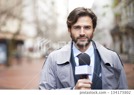Portrait, broadcast and a man with a microphone in the city for an interview or tv journalist. Smile, media and a male reporter talking with a mic for press, anchor job and reporting the news 134173802