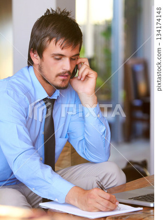 Cellphone, businessman on call and paperwork or document of schedule. Communication or consulting, man multitasking holding pen and smartphone taking notes of corporate information at office Cellphone, businessman on call and paperwork or document of schedule. Communication or consulting, man multitasking holding pen and smartphone taking notes of corporate information at office 134174148