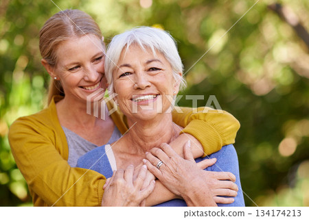 Senior mother, woman and hug outdoor with happiness, love and care in portrait by trees on holiday. Elderly mama, lady and embrace with bond, excited face and support in backyard with summer sunshine Senior mother, woman and hug outdoor with happiness, love and care in portrait by trees on holiday. Elderly mama, lady and embrace with bond, excited face and support in backyard with summer sunshine 134174213