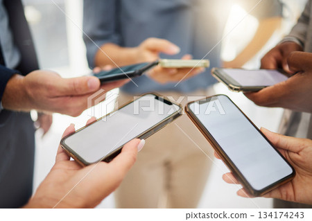 Group, business people and blank phone screen for mockup space, mobile app and multimedia networking. Closeup hands of employees with smartphone technology, digital download and team sharing UI data Group, business people and blank phone screen for mockup space, mobile app and multimedia networking. Closeup hands of employees with smartphone technology, digital download and team sharing UI data 134174243