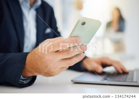 Phone, business and laptop with hands of man in office for research, planning and networking. Technology, digital and communication with male employee for contact, online connection and email Phone, business and laptop with hands of man in office for research, planning and networking. Technology, digital and communication with male employee for contact, online connection and email 134174244