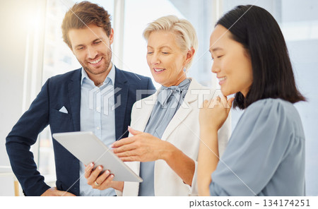 Coaching, tablet and smile with business people in office for idea, support and collaboration. Diversity, technology and report with group of employees in corporate company for planning and strategy 134174251