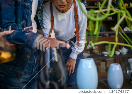 Seniors serving pottery 134174277