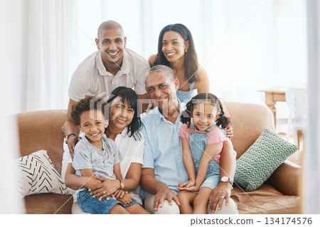 Portrait, big family and smile in home on sofa, bonding or having fun in living room. Grandparents, parents and happiness of children, care and enjoying quality time together on couch in lounge. 134174576