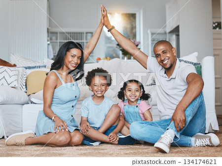 Security, family and portrait of parents and children on floor bonding, quality time and relax in living room. New home, insurance and happy mom, father and kids with smile, roof icon and happiness Security, family and portrait of parents and children on floor bonding, quality time and relax in living room. New home, insurance and happy mom, father and kids with smile, roof icon and happiness 134174621