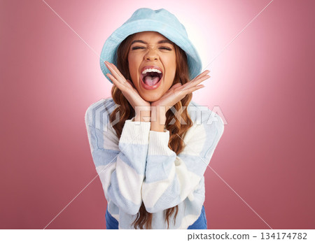 Portrait, surprise and woman excited, scream and cheerful against a studio background. Face, female and girl with excitement, happiness and celebration with emoji, facial expression and omg with wow 134174782