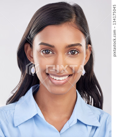 Face, happy and portrait of Indian woman relax feeling confident, smile and closeup isolated in a studio white background. Employee, head and female worker proud, happiness and confidence 134175045