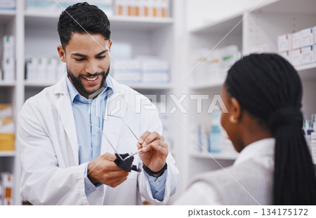 Vision, lens or cleaning glasses for man in pharmacist work helping a customer at pharmacy shop. Cleaner, eyewear clean and happy healthcare worker in a retail store working at a clinic with a frame Vision, lens or cleaning glasses for man in pharmacist work helping a customer at pharmacy shop. Cleaner, eyewear clean and happy healthcare worker in a retail store working at a clinic with a frame 134175172