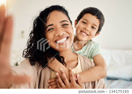 Smile, selfie and mother with child on a bed hug, love and bonding in their home together. Portrait, embrace or woman with son in bedroom waking up, happy and posing for profile picture, photo or pov Smile, selfie and mother with child on a bed hug, love and bonding in their home together. Portrait, embrace or woman with son in bedroom waking up, happy and posing for profile picture, photo or pov 134175193