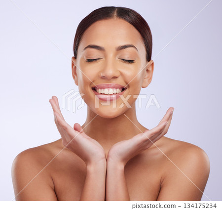 Woman smile, natural beauty and clean skincare in a studio with happiness and smile from dermatology. Skin glow, facial and cosmetics of a young female model feeling happy from self care and wellness 134175234