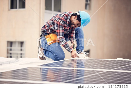 Solar panel install, engineer and black man on roof, sustainable or renewable energy mockup. Photovoltaic technician, electricity and happy person check, maintenance or inspection with screwdriver. 134175315