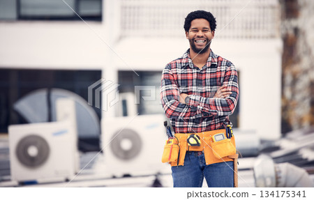 Engineering, portrait and man arms crossed on roof air conditioning, maintenance and technician ac repair. Happy African person, handyman or electrician contractor for aircon or electricity service 134175341