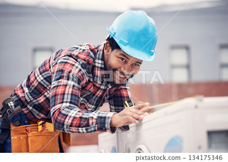 Man, measuring tape and air conditioner repair with inspection, installation or quality assurance on rooftop. African electrician, aircon and smile for maintenance, service check or hvac engineering 134175346
