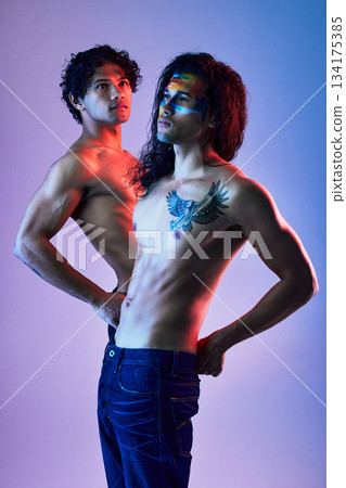 Skin, creativity and body of men model for beauty with paint as artwork isolated in a purple studio background. Colorful, neon and creative people for artistic beauty or fashion in a backdrop 134175385