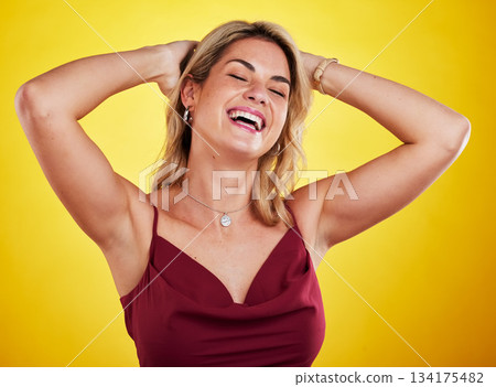 Fashion, funny comedy and woman laughing, happy and smile for style, humor or comic joke. Beauty, luxury apparel clothes and stylish female model with cosmetic makeup isolated on yellow background 134175482