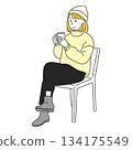 Woman relaxing by drinking a hot drink 134175549