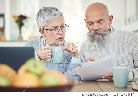 Laptop, senior couple and finance documents in home for budget, savings or taxes in house. Computer, retirement and man and woman with paperwork for financial planning, insurance or bills with coffee 134175614