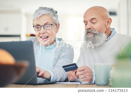 Laptop, senior couple and credit card in home for online shopping, digital banking or payment. Computer, ecommerce and happiness of man and woman on internet for sales, retirement finance or fintech. Laptop, senior couple and credit card in home for online shopping, digital banking or payment. Computer, ecommerce and happiness of man and woman on internet for sales, retirement finance or fintech. 134175615
