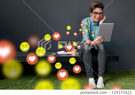 Office, social media icon or happy woman with tablet for communication, texting or online dating chat. Funny, meme or girl on mobile app website or digital network with smile, like or heart emoji Office, social media icon or happy woman with tablet for communication, texting or online dating chat. Funny, meme or girl on mobile app website or digital network with smile, like or heart emoji 134175822