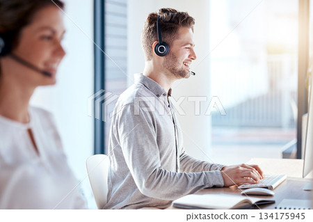 Call center, computer and consulting with man in office for customer service, technical support and advice. Technology, contact us and communication with employee operator in help desk agency 134175945