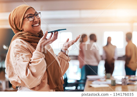 Phone call, laughing and business with muslim woman in office for communication, voice recording and networking. Technology, mobile and contact with arab female in startup agency for chat and speaker 134176035