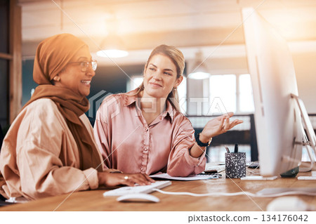 Talking, women and training for business on a computer for advice, help and corporate collaboration. Happy, diversity and Muslim employee with a manager speaking, mentoring and helping with pc work 134176042