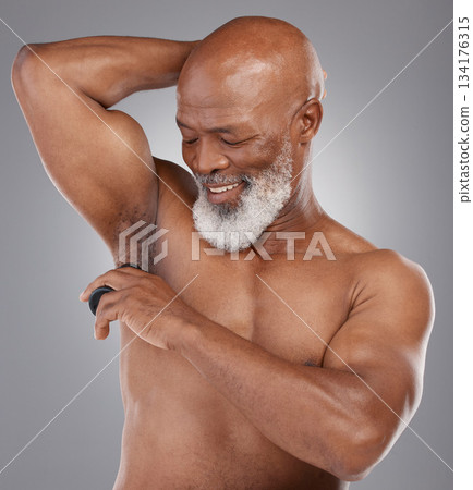 Skincare, shaving armpit and black man with a smile, grooming and routine with guy against a dark studio background. Senior male, happy person and model with hygiene, cosmetics and hair removal Skincare, shaving armpit and black man with a smile, grooming and routine with guy against a dark studio background. Senior male, happy person and model with hygiene, cosmetics and hair removal 134176315