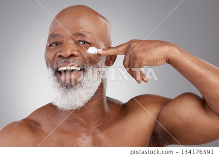 Skincare cream, happy and portrait of old man for wellness, cosmetics and facial creme. Dermatology, beauty and male model apply anti aging lotion, face product and moisturizer on studio background 134176391