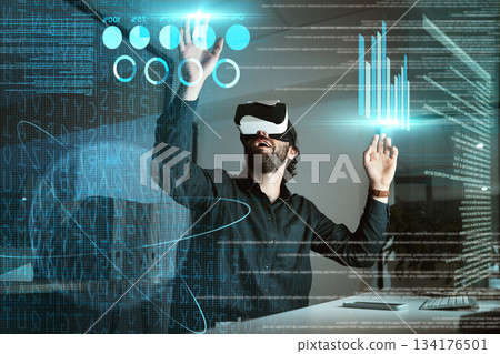 Virtual reality, business man and 3d graphs for working on statistics, data or hologram at night. Metaverse, vr and professional person with futuristic technology with charts, analytics and overlay. Virtual reality, business man and 3d graphs for working on statistics, data or hologram at night. Metaverse, vr and professional person with futuristic technology with charts, analytics and overlay. 134176501