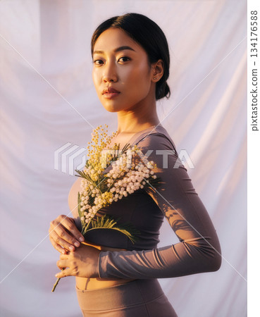Mimosa flowers and Japanese woman Mimosa flowers and Japanese woman 134176588