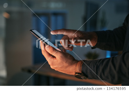 Phone, night or hands of businessman typing in communication, global networking or searching. Entrepreneur, dark office or zoom of person on social media or mobile app reading email, text or chatting Phone, night or hands of businessman typing in communication, global networking or searching. Entrepreneur, dark office or zoom of person on social media or mobile app reading email, text or chatting 134176595