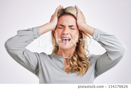 Stress, headache and woman in studio with anxiety, brain fog and pain against white background. Migraine, depression and female person suffering from problem, vertigo and burnout, frustrated or tired 134176626